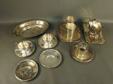 a lot of silver items on the table