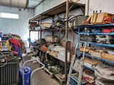 a room filled with lots of assorted items and tools