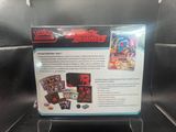 a close up of a display case with a card game on it