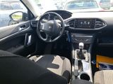 the interior of a car with a steering wheel and dashboard controls