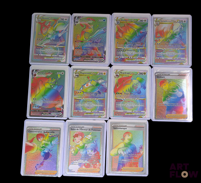 a lot of different pokemon cards on the table