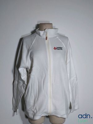 the jacket is white and has a logo on it