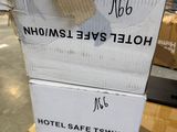 a box that has a sign on it that says hotel safe twikin