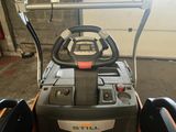 a picture of a forklift with a steering and a steering wheel
