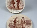 two plates with a picture of a man and a woman on them