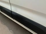 a white car with a black stripe on the side of it