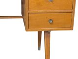 a wooden desk with a glass top and two drawers