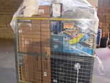 a cart with a lot of boxes on it in a warehouse