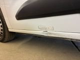 a close up of a car ' s bumper with a sticker on it