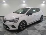 the white car is parked on a checkered floor in a garage