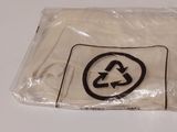 a plastic bag with a recycle logo on it