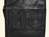 a black leather bag with the m u logo on it