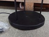 an image of a cell phone charging station on the floor