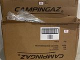 two boxes of campingaz are stacked on top of each other