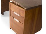 a close up of a desk with two drawers and a wooden top