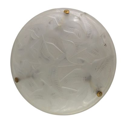 an image of a glass ceiling light with a pattern on it