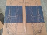 a cardboard box with a drawing of a car on it