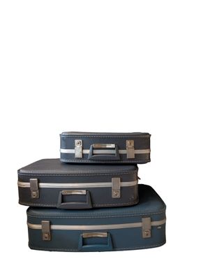 Lot de cinq valises de voyages
