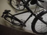 a bicycle that is sitting on the floor in the room