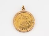 an image of a close up of a gold coin on a white surface