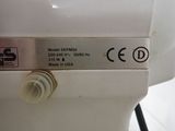 a close up of a sewing machine with a label on it