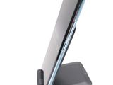 a cell phone that is sitting on a stand