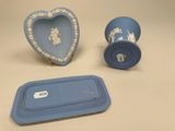two blue and white vases and a blue container