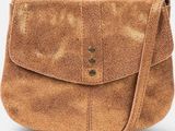 an image of a brown leather purse with a strap