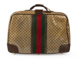 a brown and green suitcase with a red, green, and white stripe