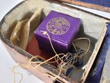 a purple box that has a purple object inside of it