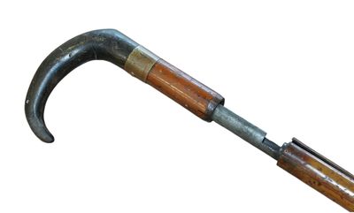 an old hammer with a wooden handle on a white background