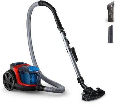 a red and blue vacuum cleaner with a black handle
