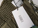 an image of a pair of pants with a tag on them