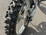 a motorcycle that is parked on the side of the road