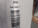 a close up of a white refrigerator with a barcode on it
