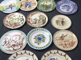 many plates that are sitting on a black table