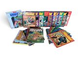 the batman comics are lined up in a row on a white surface