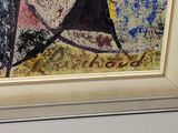 a picture of a painting on the wall of a room