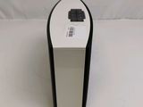 an image of a white and black speaker sitting on top of a white table
