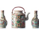 three vases and a teapot sitting next to each other