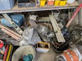 a lot of tools that are sitting on a shelf