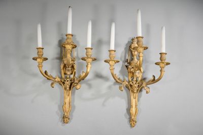 pair of antique wall sconces in the style of louis ii