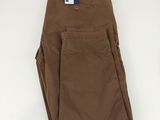 a close up of a pair of brown pants on a white surface