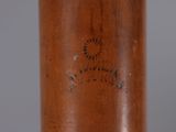 a close up of a baseball bat on a table