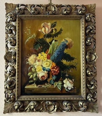 a picture of a painting of flowers in a gold frame