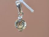 a small crystal bead hanging from a string