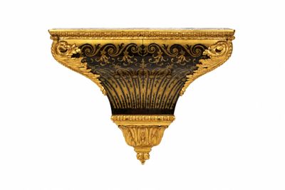 an image of a gold and black shelf with a clock on it