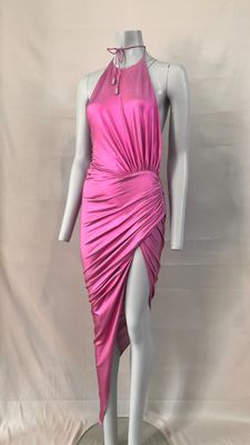 the mannequin is wearing a pink dress with a high neck
