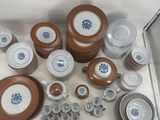 a lot of different types of china on the table