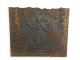 an old metal plaque with a woman and a dog on it